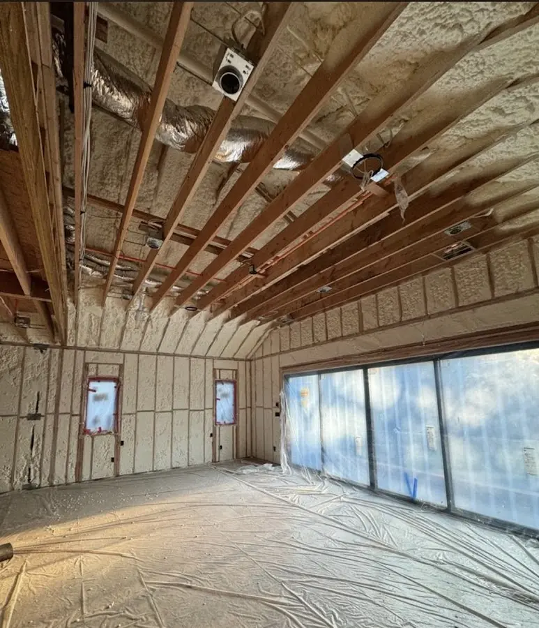Interior walls and ceiling insulated with spray foam during new construction in Mount Hood Villages